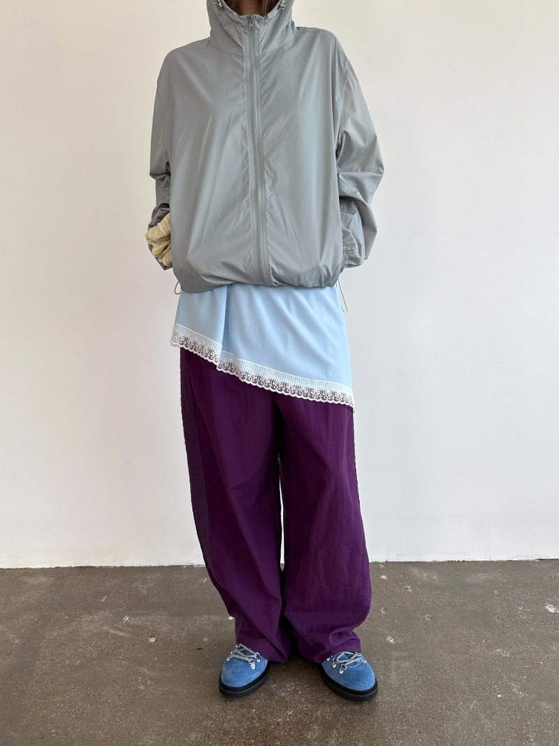 another language（アナザーランゲージ）の「side lace nylon pants（Pants）」