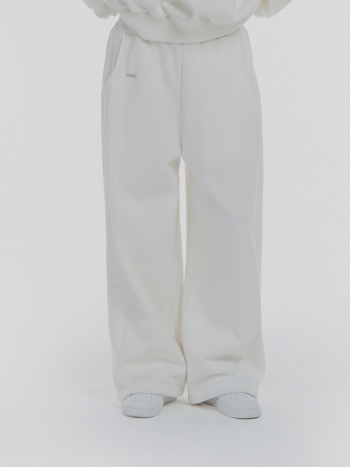 [mnem] pintuck logo jogger pants (white)