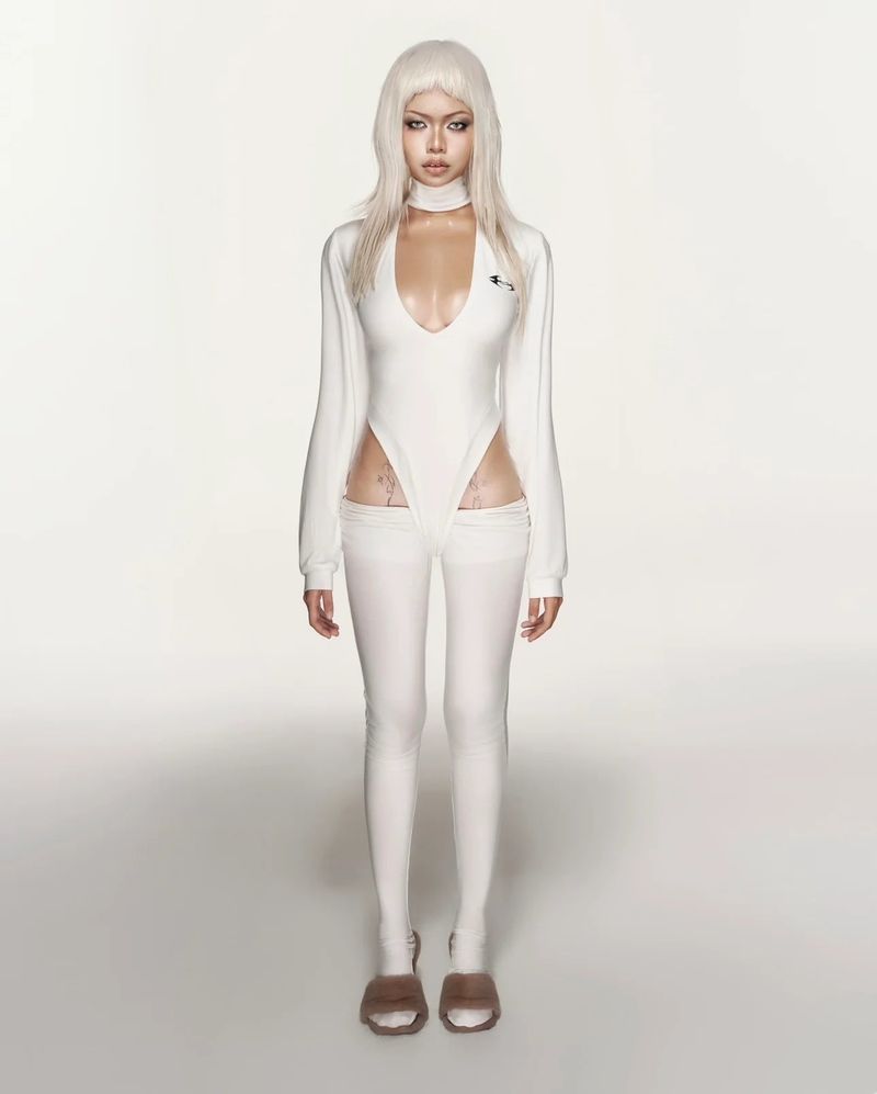 Cozy Worldwide(コージー ワールドワイド)の「“Sculpted White Cyber Cut-Out Pants”(Pants)」