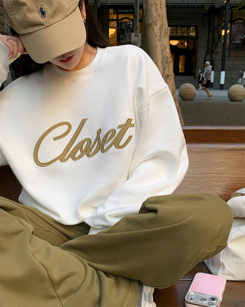 BEIDELLI（ベイデリー）の「[ORIGINAL] RONDALETTERING SWEATSHIRT（Tops）」