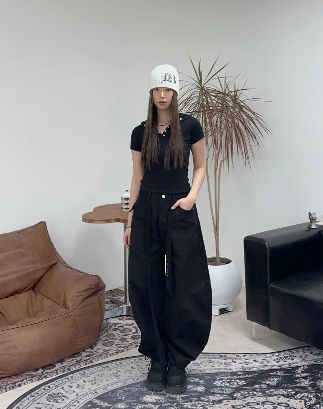 Pale studded strap pants