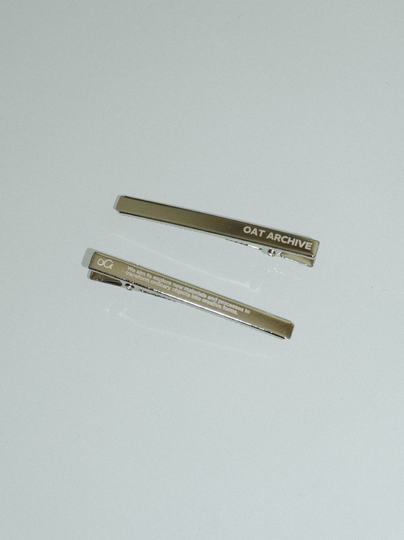 Silver logo hair pin