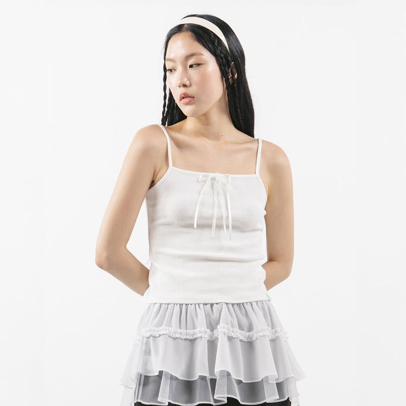 TUOMIO（トゥオミオ）の「POINTELLE RIBBON CAMI [IVORY]（Tops）」