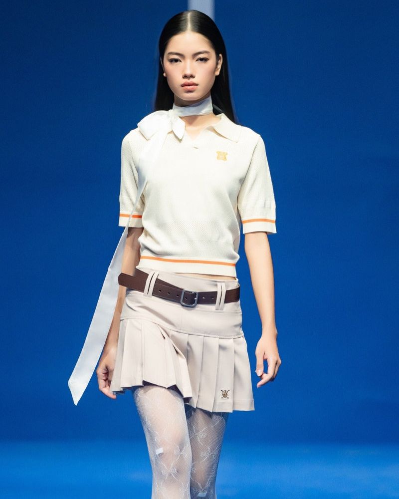 DVRK（ダーク）の「DVRK PRIVÉ BUTTONLESS POINTELLE KNITTED CROPPED POLO - CREAM（Tops）」