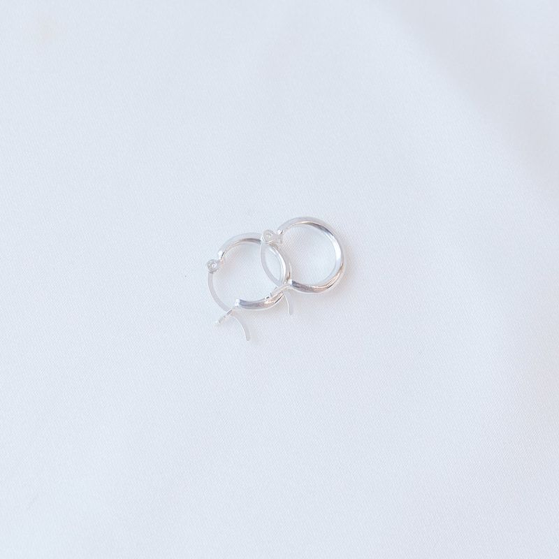 tiny crescent earring
