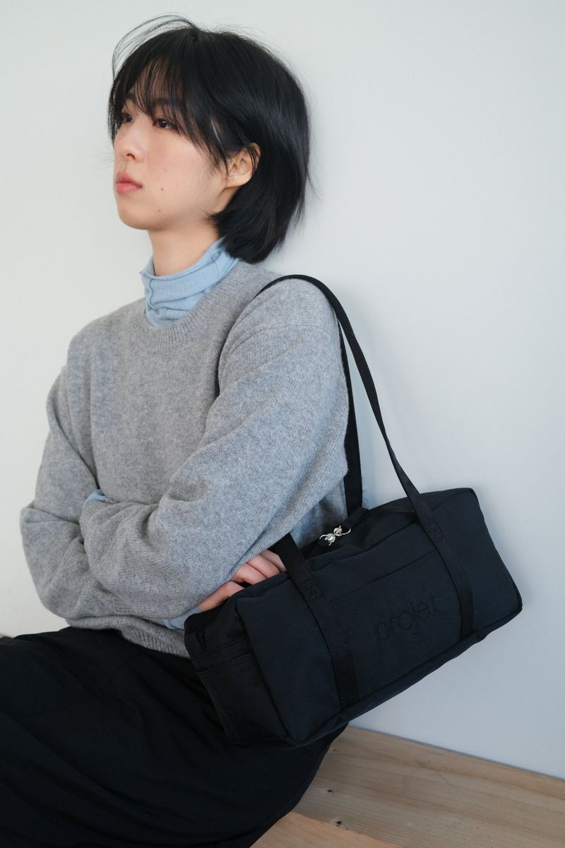 projet（プロジェ）の「compact duffle bag (black)（Bags）」