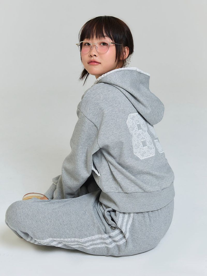 ADORE BELLE(アドールベル)の「LACE APPLIQUE HOOD ZIP-UP - GRAY(Tops)」