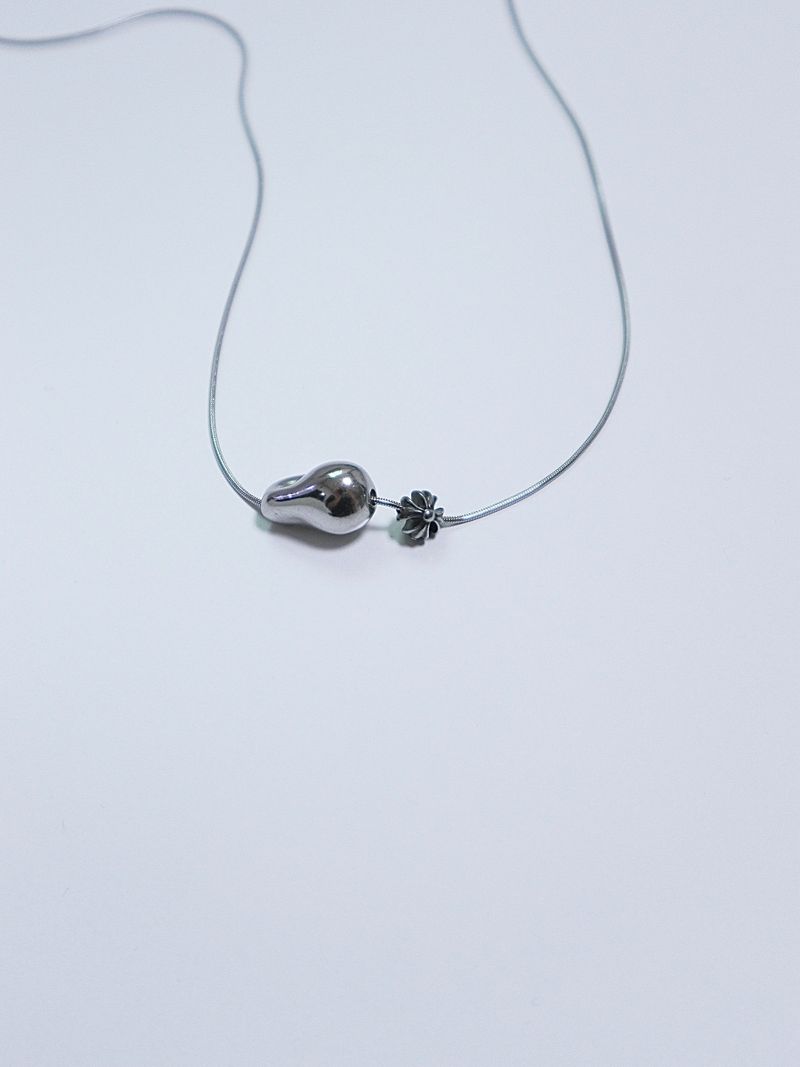 All surgical steel object cross necklace