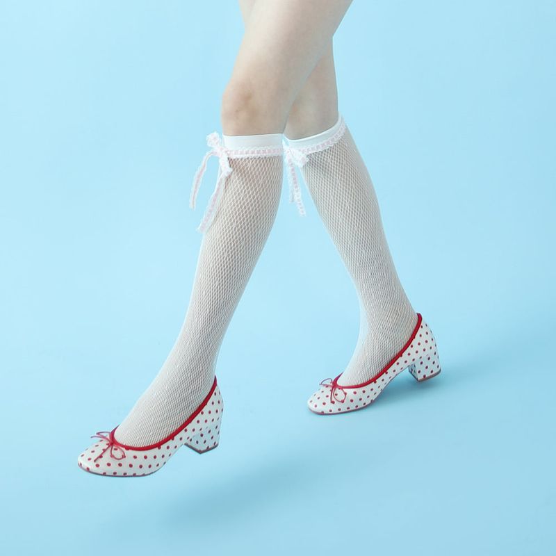 onnitella（オニテラ）の「ribbon dia dot fishnet knee socks (white)（Fashion Accessories）」