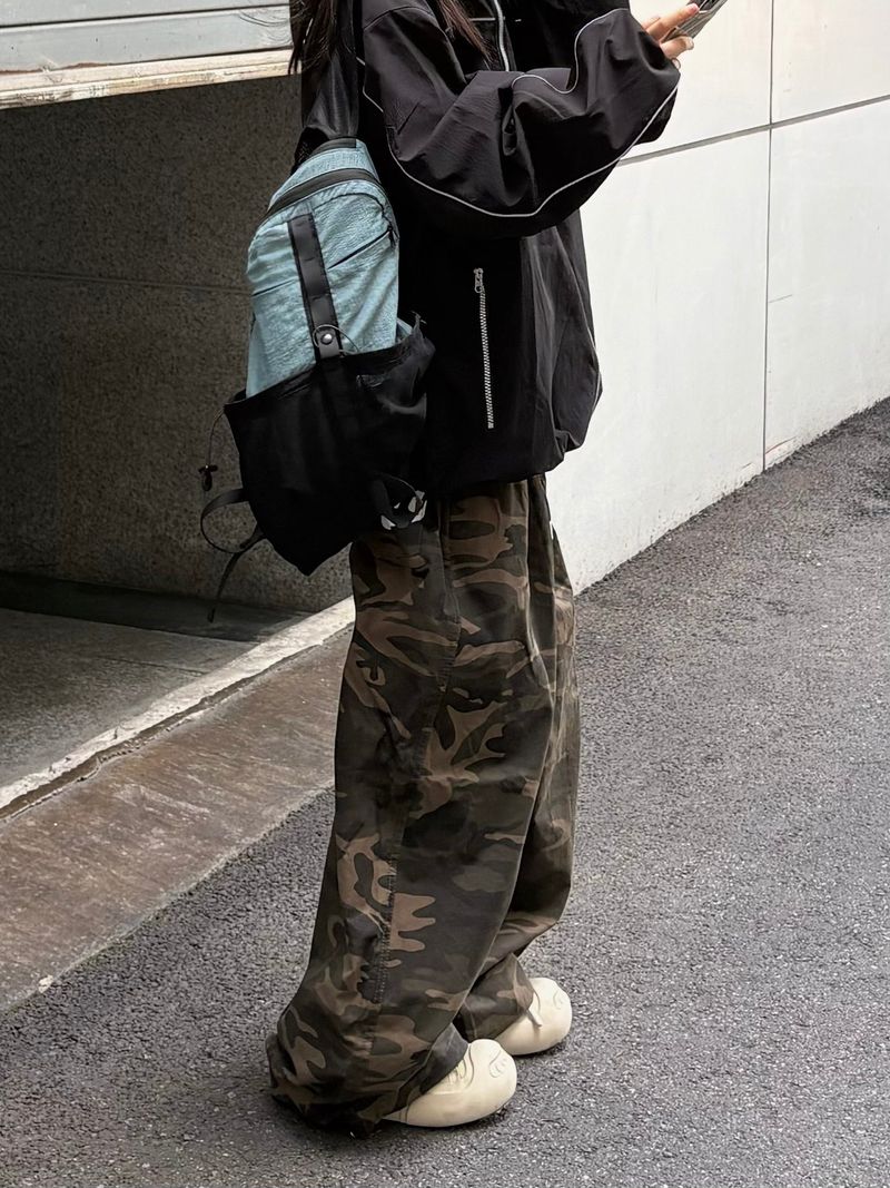 dual pocket mesh backpack