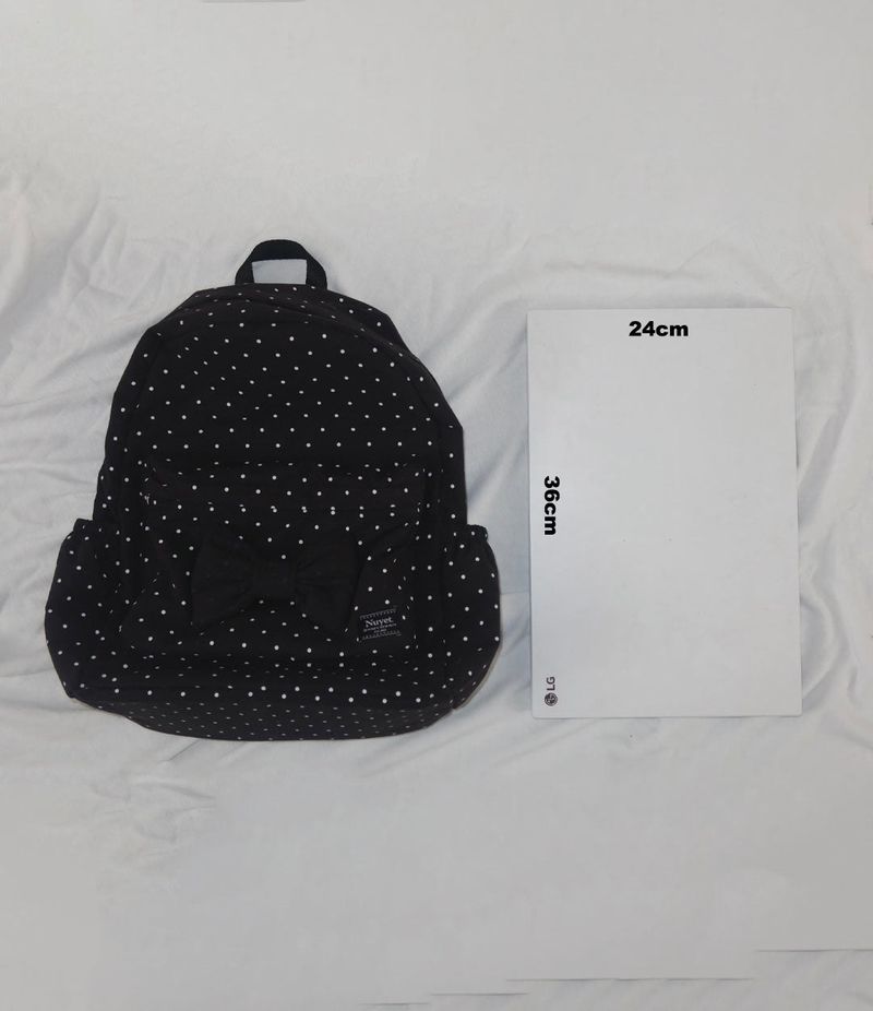 Polka dot ribbon backpack