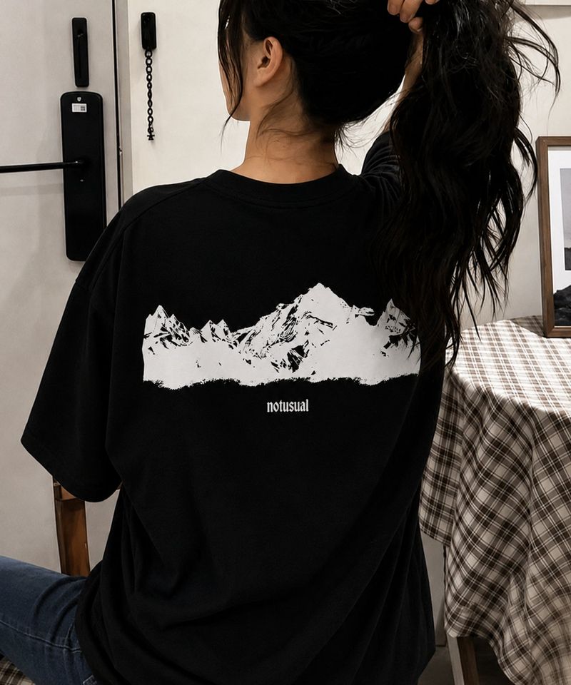 NOTUSUAL（ノットユージュアル）の「マウンテンシルエットオーバーフィットTシャツ - 4COLOR（トップス）」