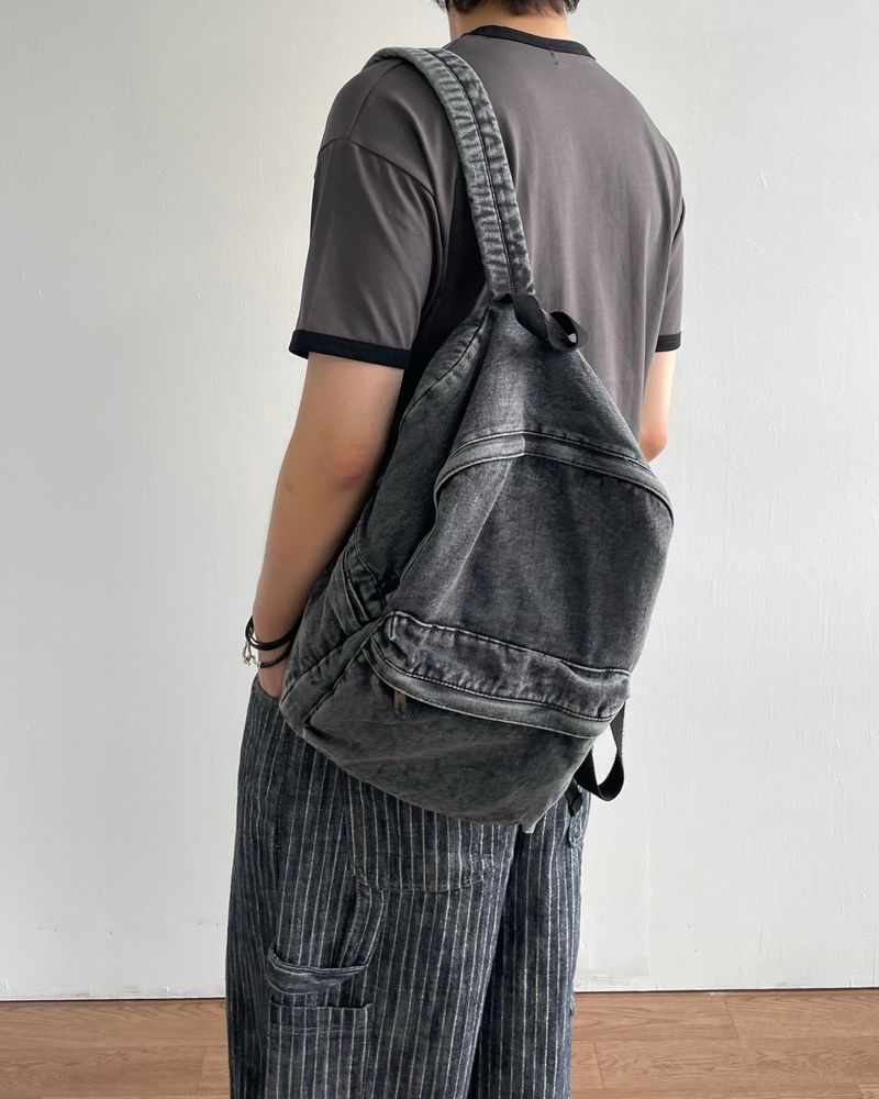 Washed denim backpack