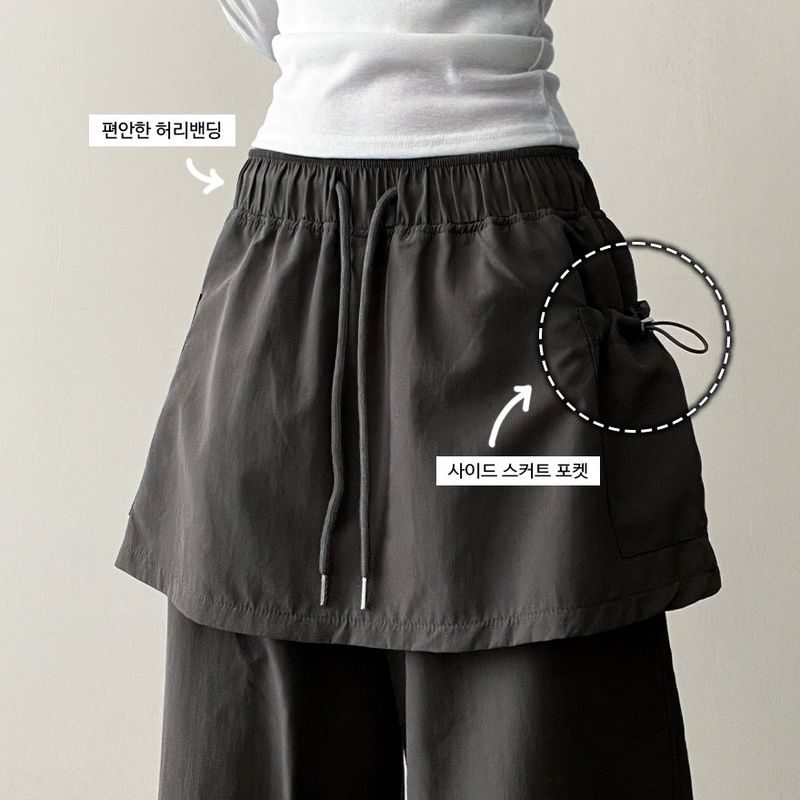 Log banding layered pocket skirt pants