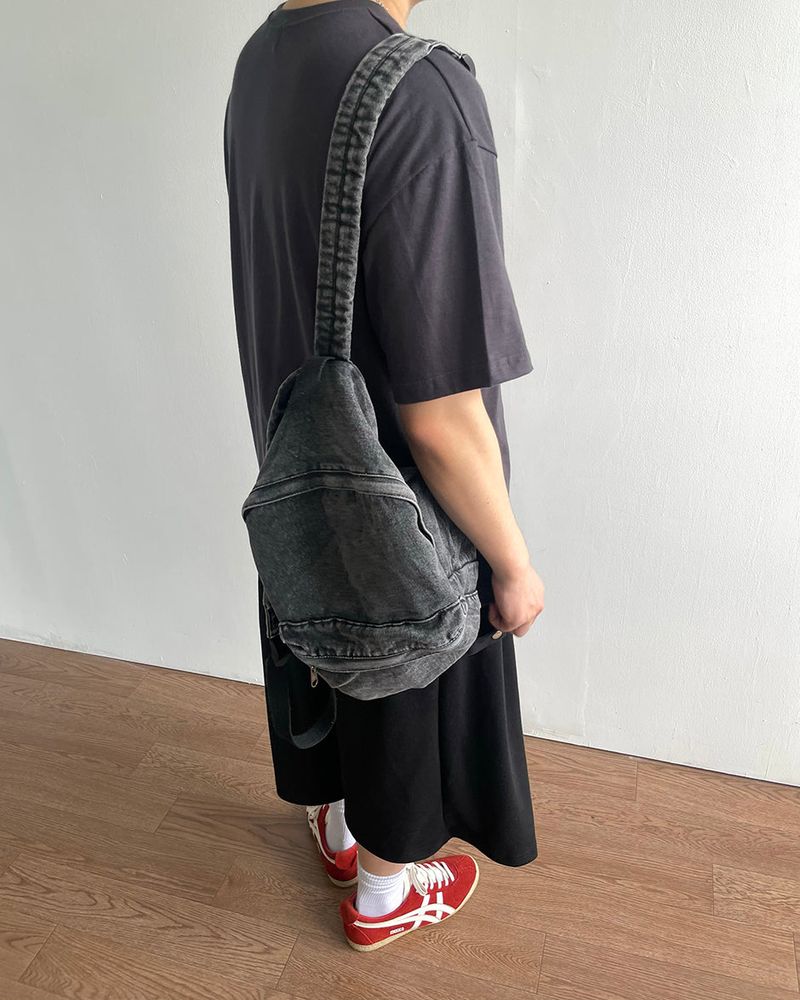 Washed denim backpack