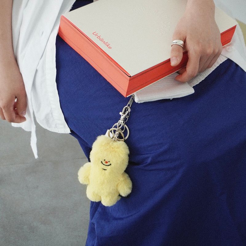 tuteogi yellow doll keyring