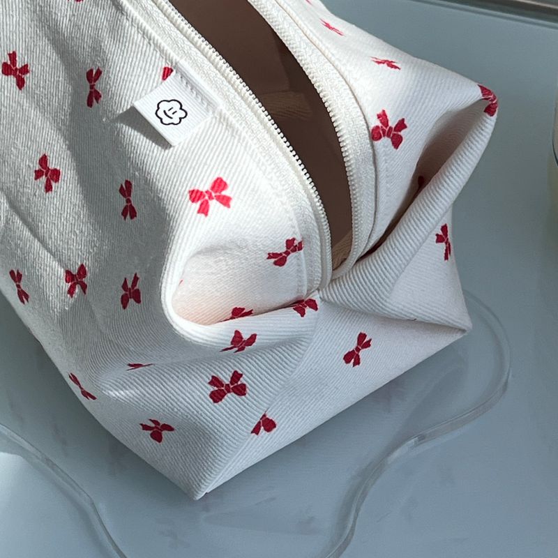 RED RIBBON ZIPPER POUCH