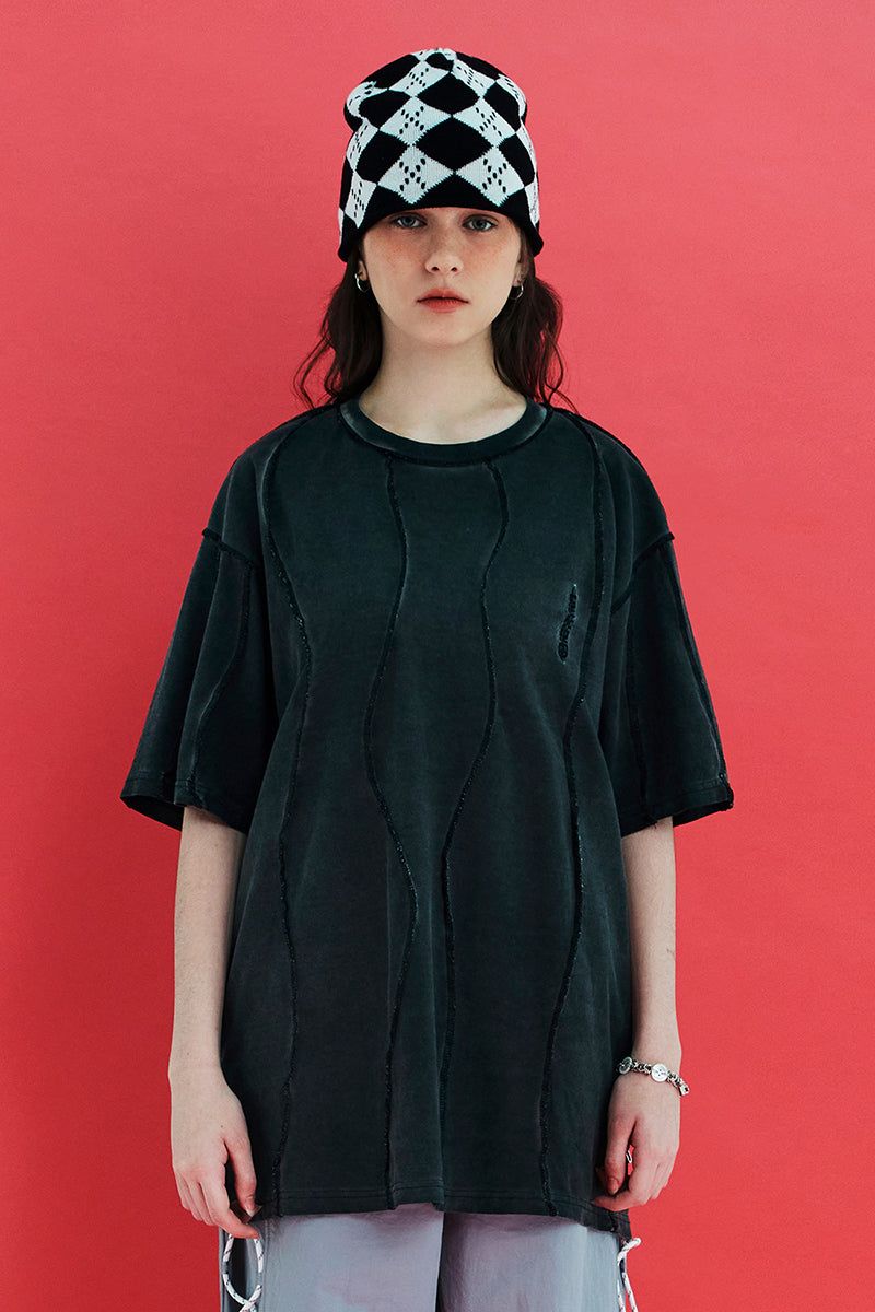 UNALLOYED(アナロイド)の「DYED WAVE OVERLOCK T SHIRT / CHARCOAL(Tops)」