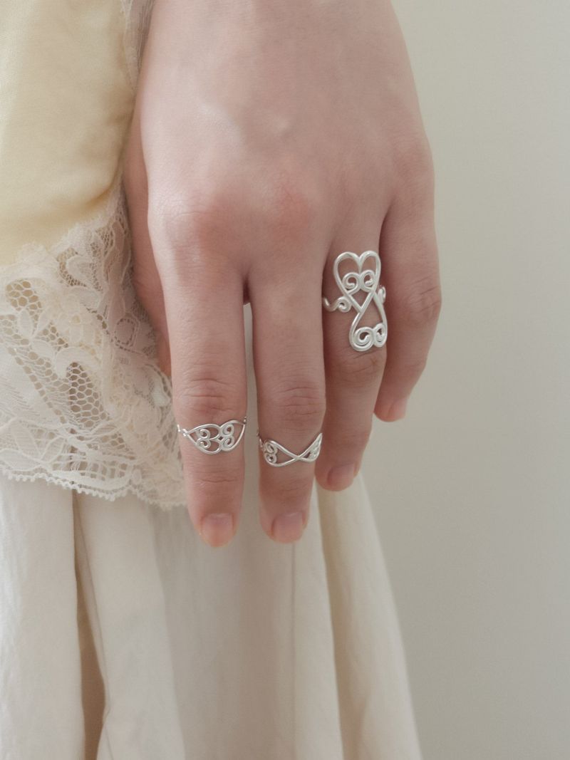 PAIR OF LOVE（ペアオブラブ）の「アシンメトリック ハート リング（アクセサリー）」