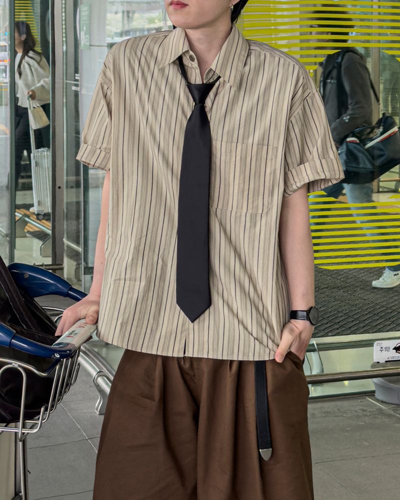 JIIGEUM（ジグム）の「Raid Stripe Half Shirt（Tops）」