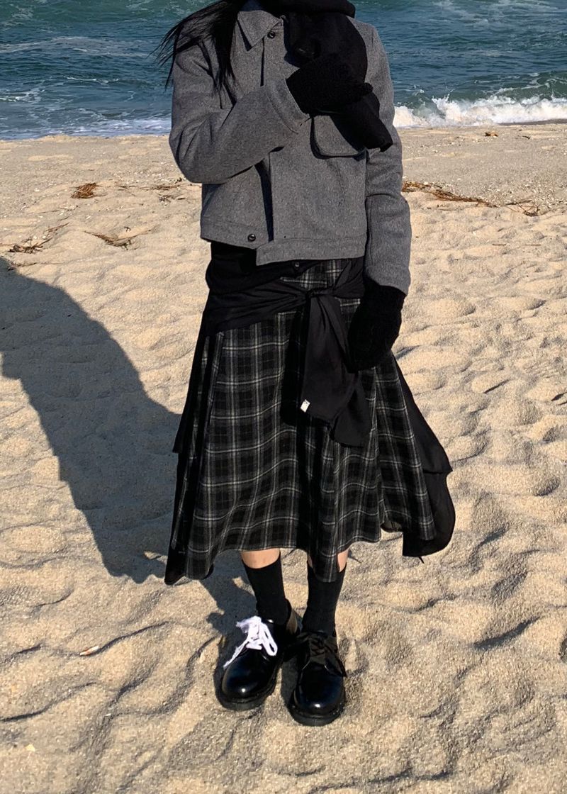 A BLACK CHECK SKIRT