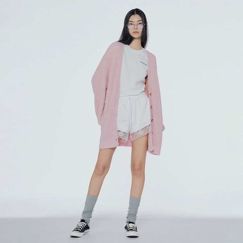 Distressed dequinned-knit cardigan