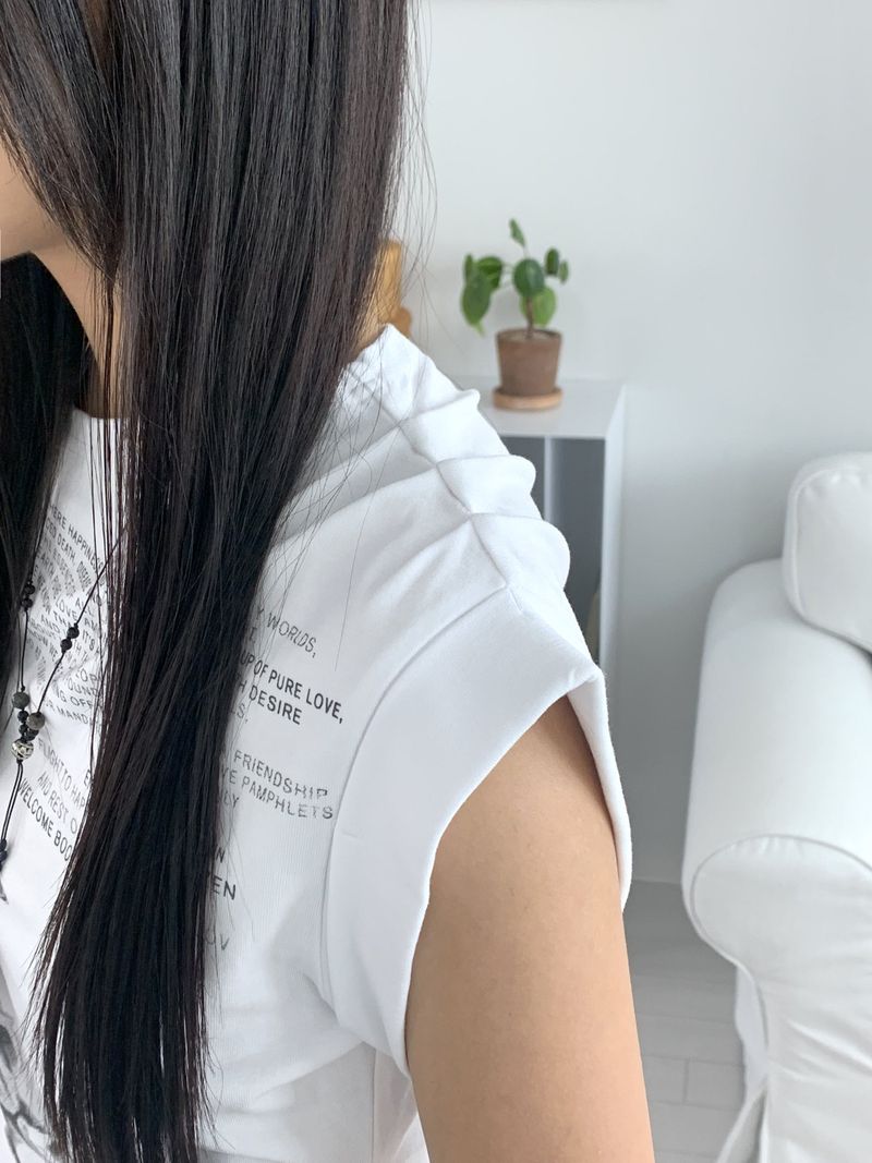 pebbled hip lettering unbalanced sleeve sleeveless