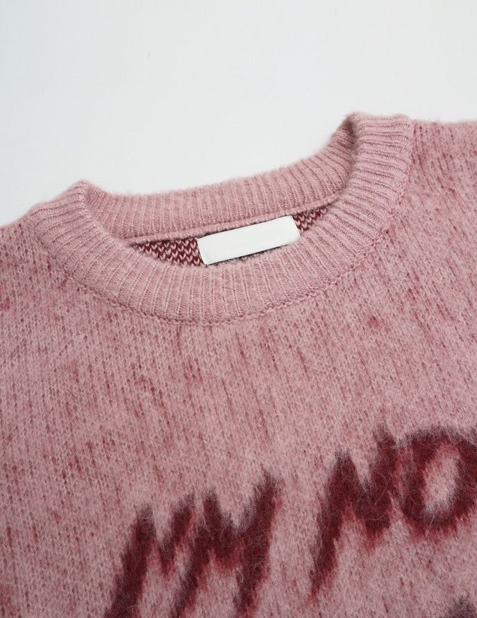Lettering brush over knit