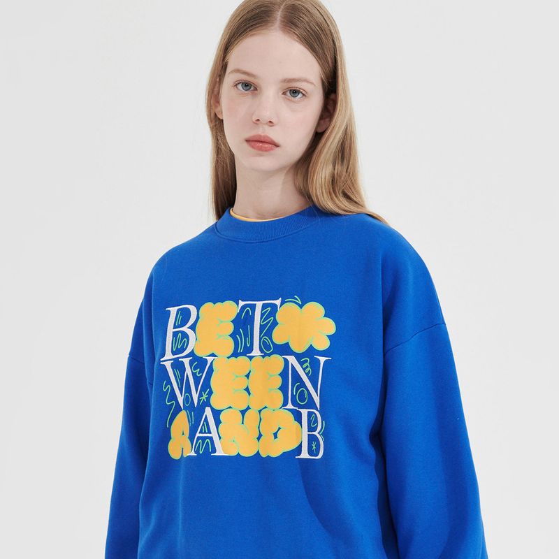 Between A and B（ビットウィーンエーアンドビー）の「Bubble Graphic Sweatshirt _ Blue（Tops）」
