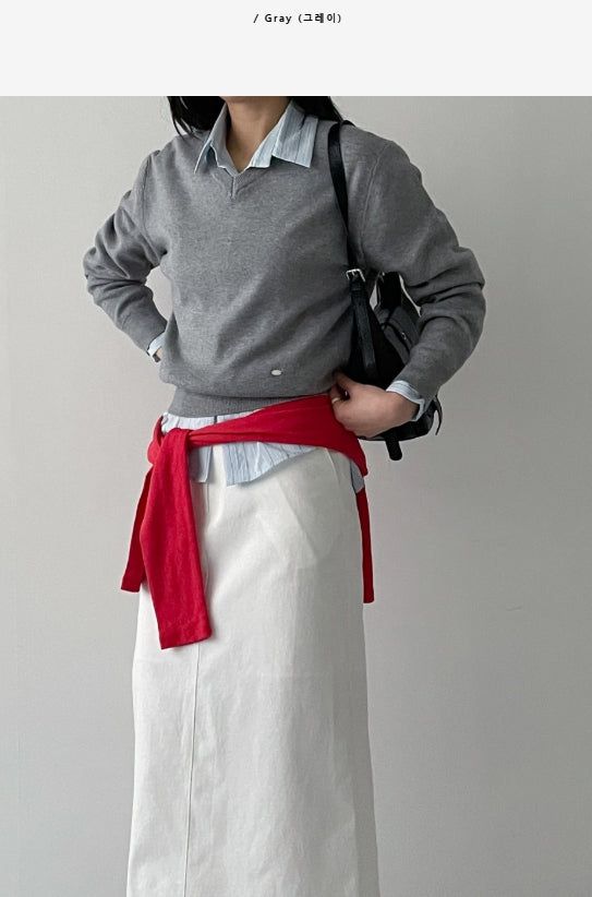 INCHANT ME(インチャントミー)の「Ad Symbol V-Neck Loose-Fit Knit(Tops)」