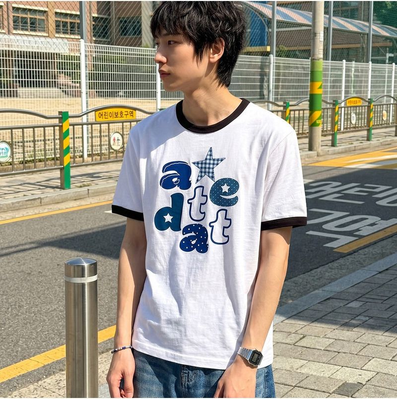 UNDEROFF(アンダーオフ)の「Essential Standard Short-Sleeve Ringer T-Shirt Alpha Appliqué White(Tops)」