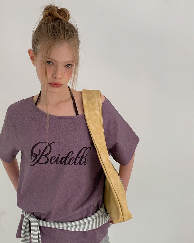 BEIDELLI（ベイデリー）の「[ORIGINAL] Wit Lettering Pigment Off-Sleeve Tee（Tops）」