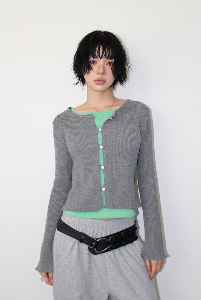 AAKE(アケ)の「MIGNON BUTTON CARDIGAN(Tops)」