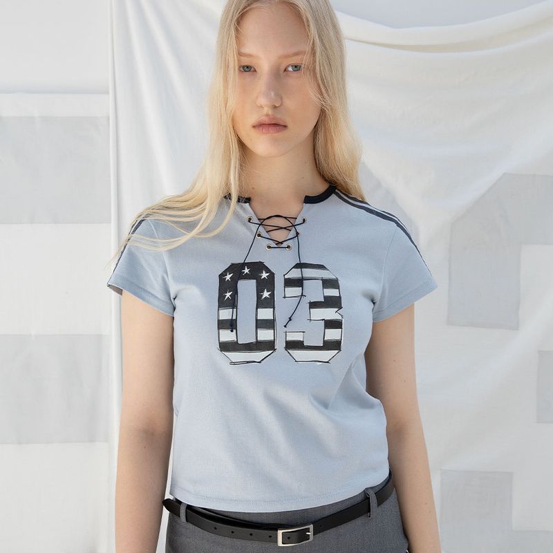 DIMANCHE（ディマンシュ）の「SPORTY LACE-UP T-SHIRT (SKY)（Tops）」