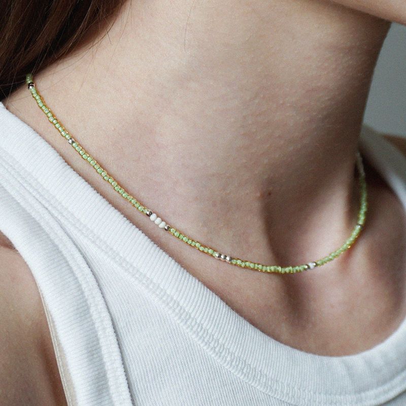 OURPIERRE（アワーピエール）の「LOVE SKINNY BEADS NECKLACE GLOW GREEN（Accessories）」