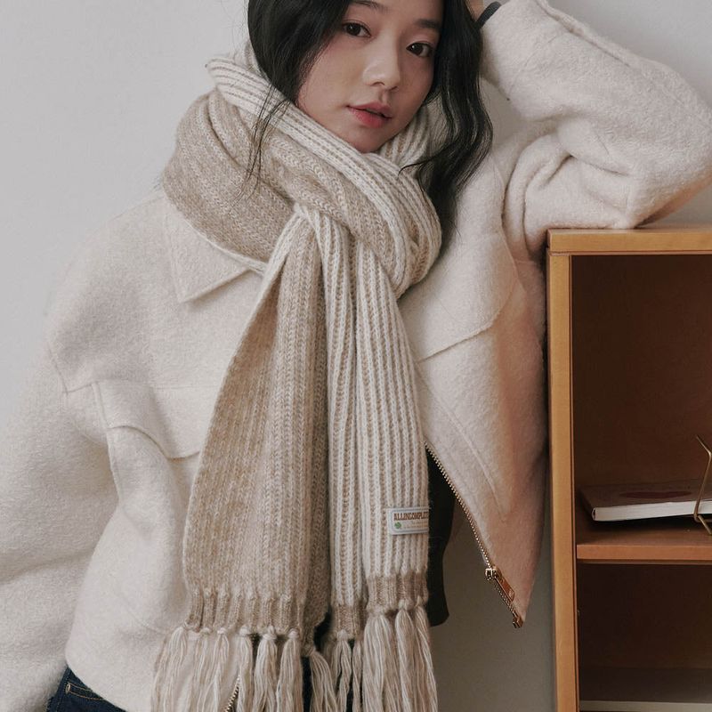 ALLINCOMPLETE（オールインコンプリート）の「Rain Tassel Knit Muffler (Beige&Cream)（Fashion Accessories）」