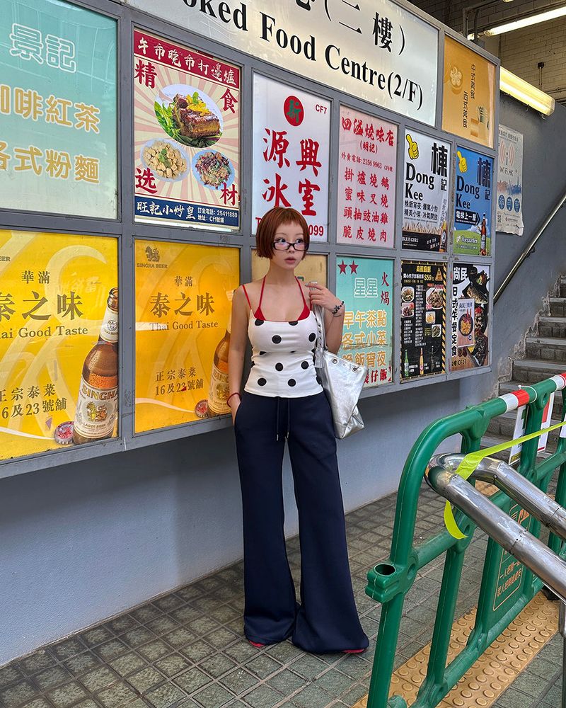 Red colored royal dot sleeveless shirt