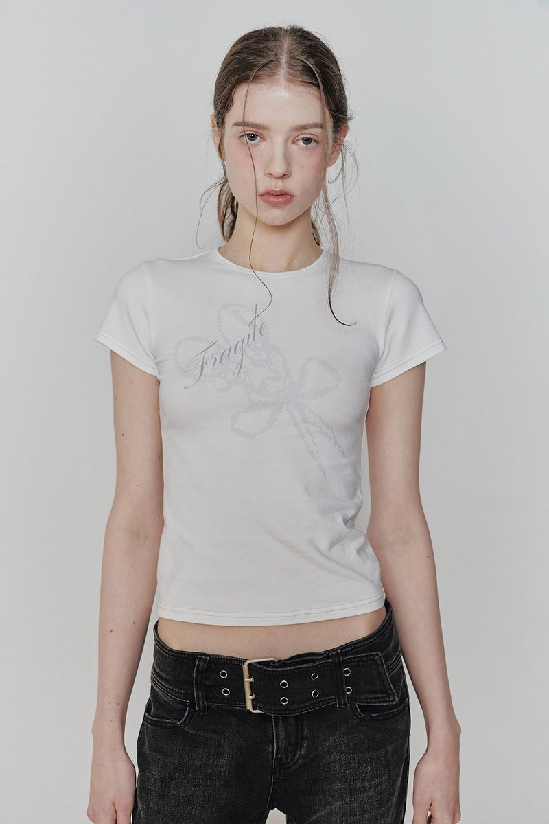 PAIN OR PLEASURE（ペインオアプレジャー）の「FRAGILE GRAPHIC TEE white（Tops）」