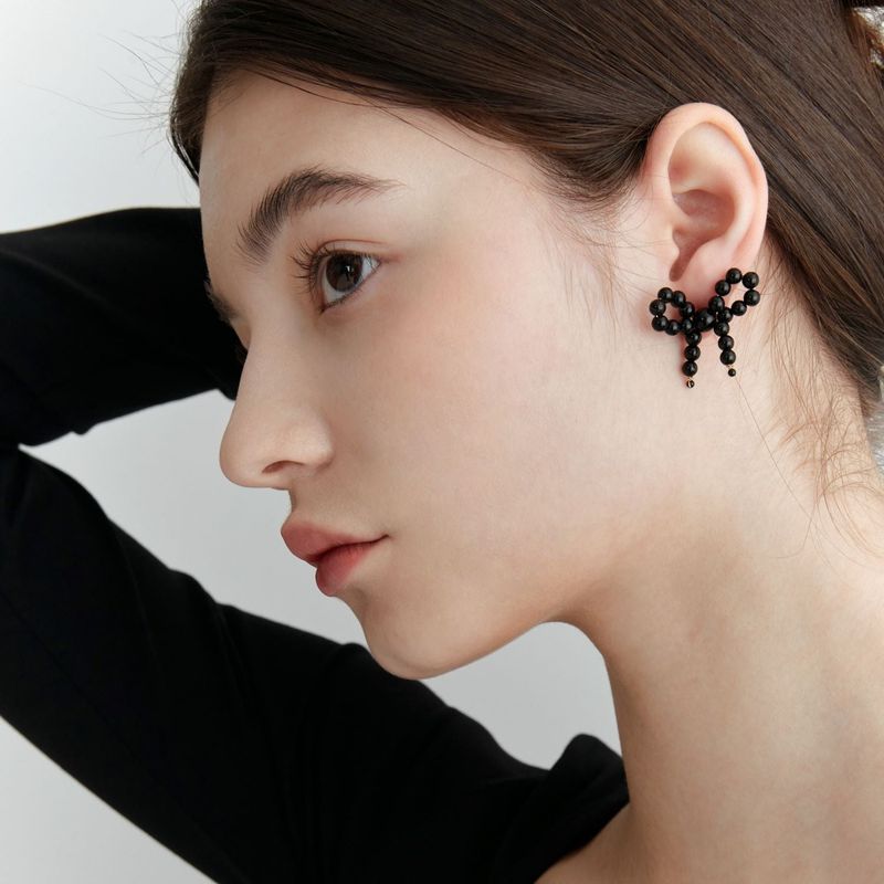 OVT-U（オーブイティーユー）の「Onyx Ribbon Earring（Accessories）」