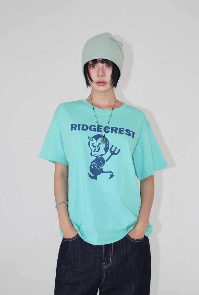 AAKE(アケ)の「DEVIL GRAPHIC TEE(Tops)」