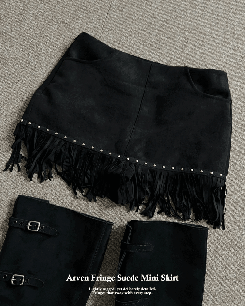 GUSTA（グスタ）の「Arven Western Fringe Suede Metal Studded Mini Skirt (2 colors)（Skirts）」