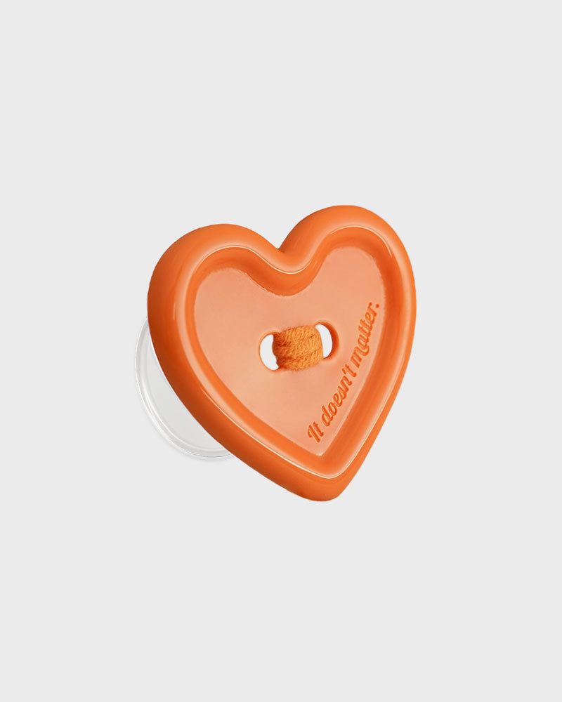 it doesn't matter.（イットダズントマッター）の「[Formica] Orange Choco Button tok, Basic（Smartphone Accessories）」