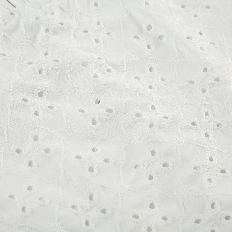 a punching eyelet bustier blouse