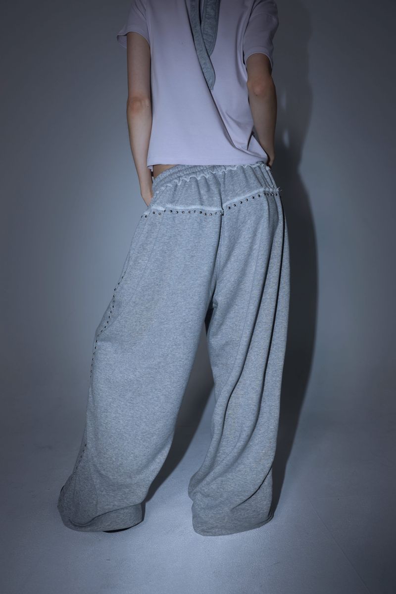 aldiyouu（アルディユー）の「Line stud string sweatpants - Gray（Pants）」