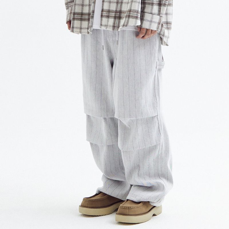 AKECII(アケシ)の「Stripe parachute denim Pants White(Pants)」