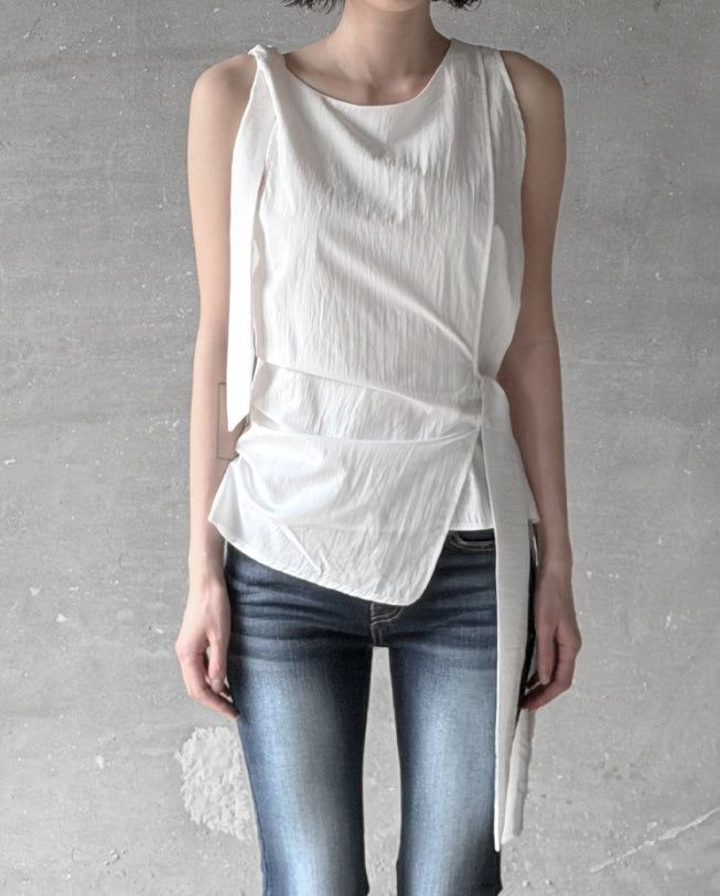 mnem（ムネム）の「Notir Unbalanced Knot Blouse（Tops）」