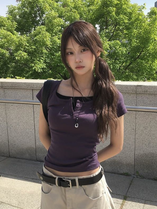 anyonemore（エニーワンモアー）の「ディオン重ね着風カラーボタン半袖Tシャツ（トップス）」