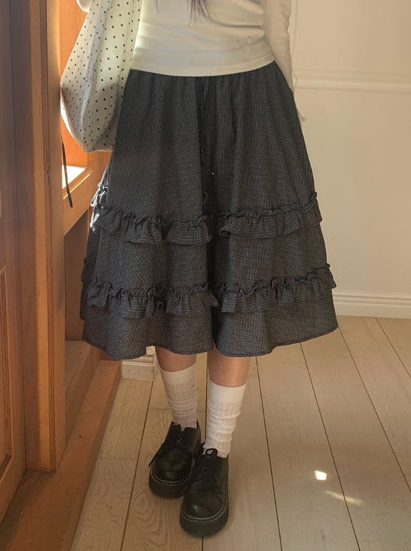anyonemore（エニーワンモアー）の「Warmin Frill Banding Check Midi Skirt（Skirts）」