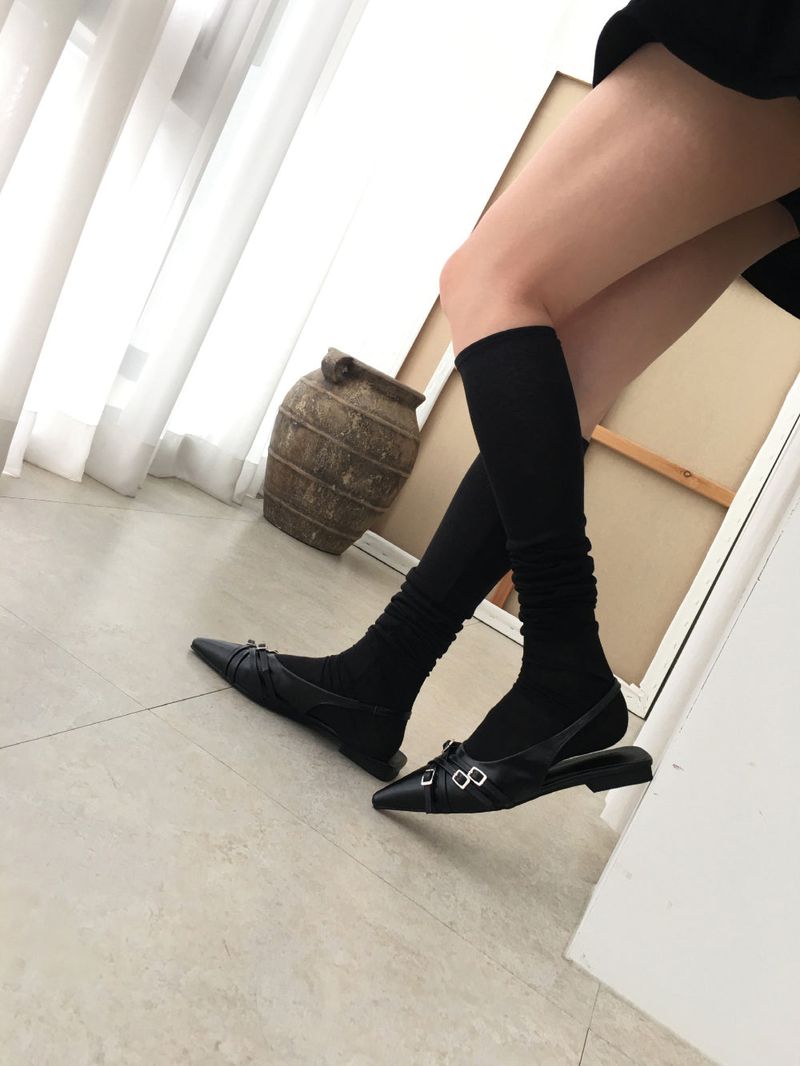 Twist belt slingback flat
