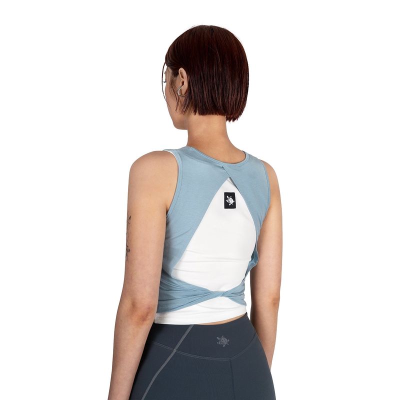WHILE（ワイル）の「RIM CROP SLEEVELESS - SORA BLUE（Tops）」